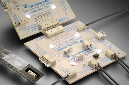 图1 泰科电子全新线对板SMT和通孔插入式连接器系列快速方便地连接LED照明模块